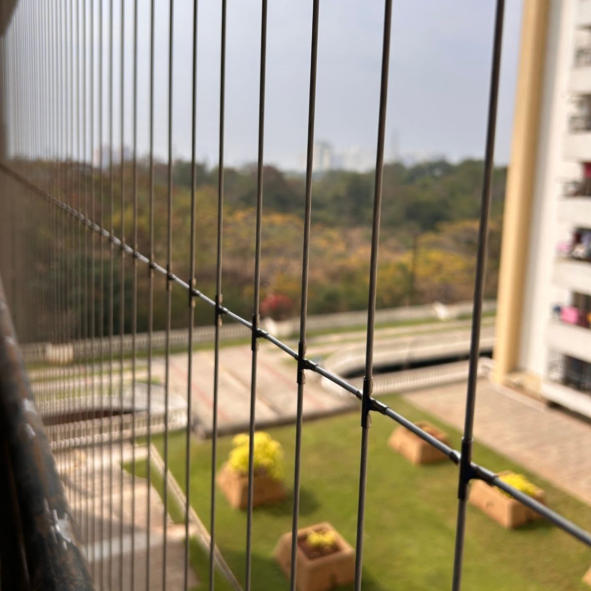 Renu Invisible Grills custom balcony invisible grill installation in Bengaluru